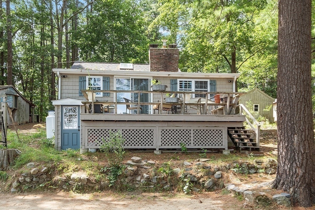 659 Reservoir Road Lunenburg, MA 01462 - Photo 22 of 41 front view of a house with a yard