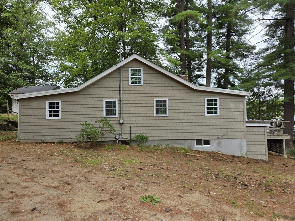 659 Reservoir Road Lunenburg, MA 01462 - Photo 26 of 41 a view of a house with a yard