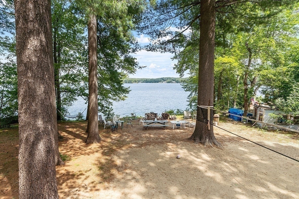 659 Reservoir Road Lunenburg, MA 01462 - Photo 29 of 41 a view of a tree in the middle of a yard