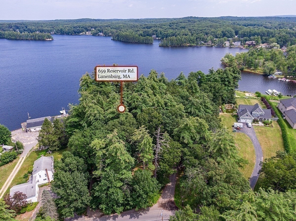 659 Reservoir Road Lunenburg, MA 01462 - Photo 30 of 41 an aerial view of a house with a lake view
