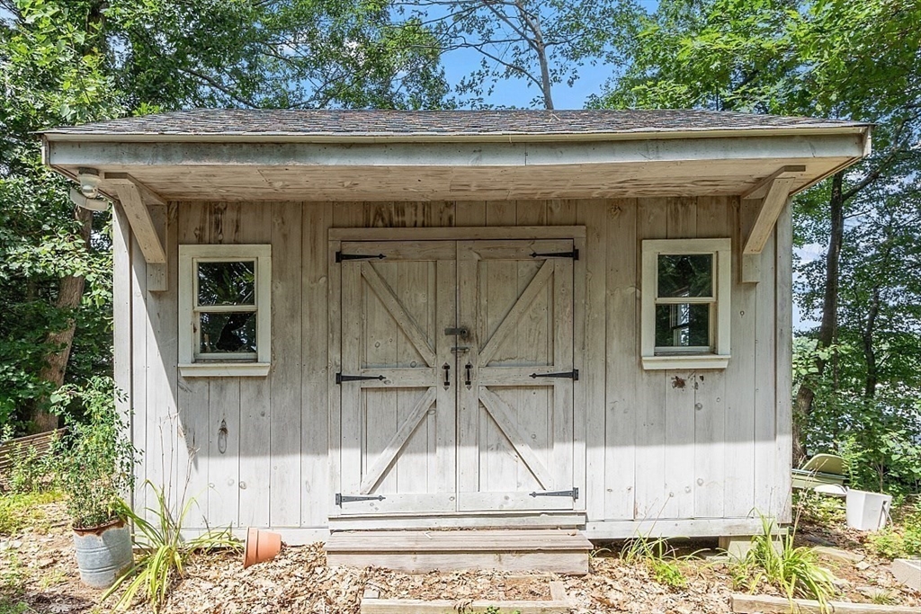 659 Reservoir Road Lunenburg, MA 01462 - Photo 36 of 41 a view of a small house