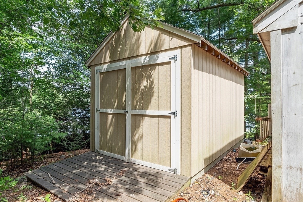 659 Reservoir Road Lunenburg, MA 01462 - Photo 37 of 41 a backyard of a house