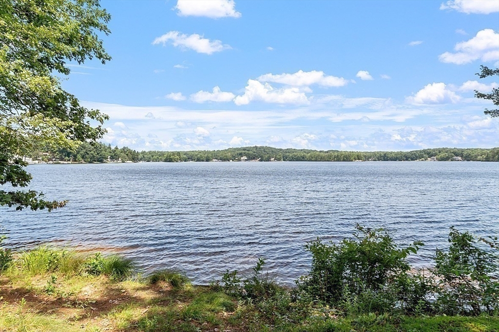 659 Reservoir Road Lunenburg, MA 01462 - Photo 41 of 41 a view of a lake with houses in the back