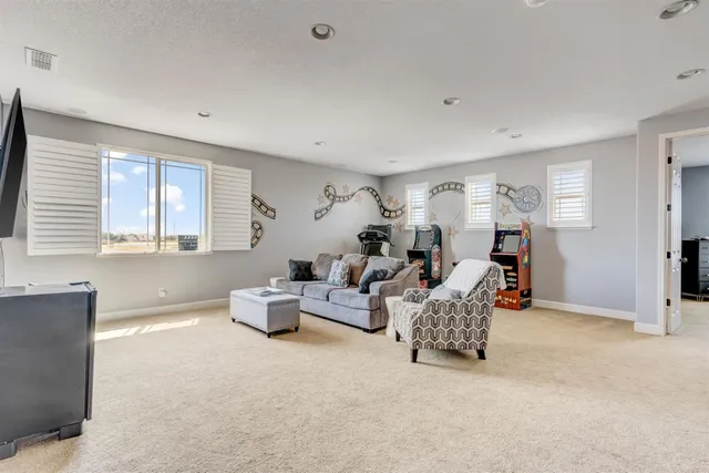 a living room with furniture and a couch