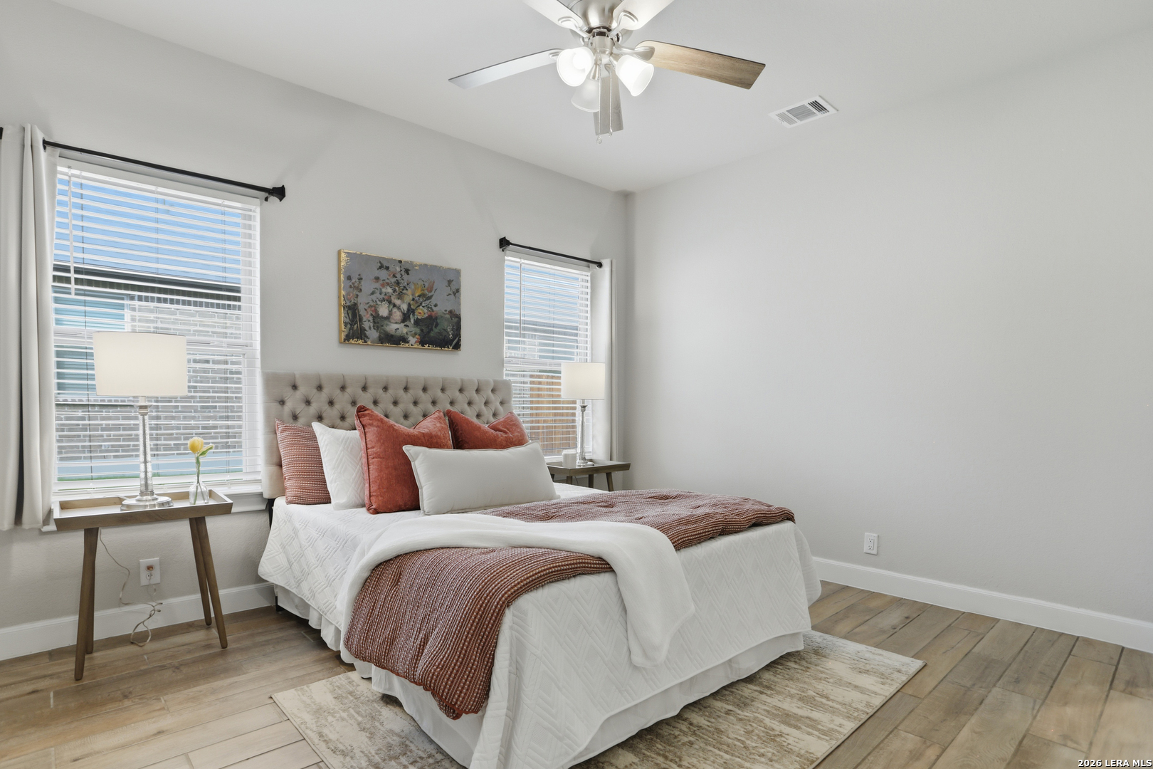 337 Misty Sails Cibolo, TX 78108 - Photo 26 of 50 a bedroom with a large bed and a window
