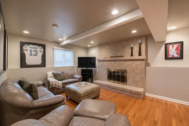 a workspace with furniture and wooden floor