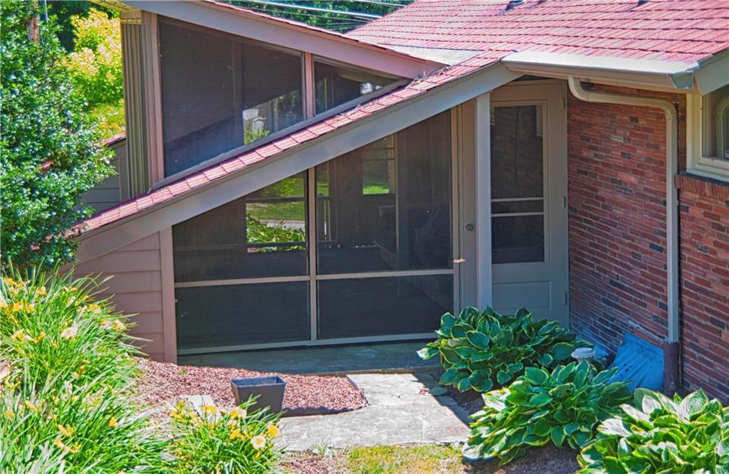 117 Lamar Road Pittsburgh, PA 15241 - Photo 22 of 25 VIEW OF SCREENED PORCH FROM OUTSIDE