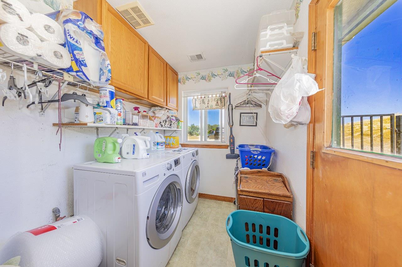 35095 Rough Rider Way Raymond, CA 93653 - Photo 26 of 57 a utility room with dryer and washer