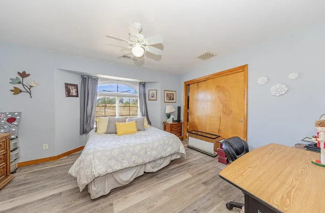 a bathroom with a double vanity sink mirror and shower
