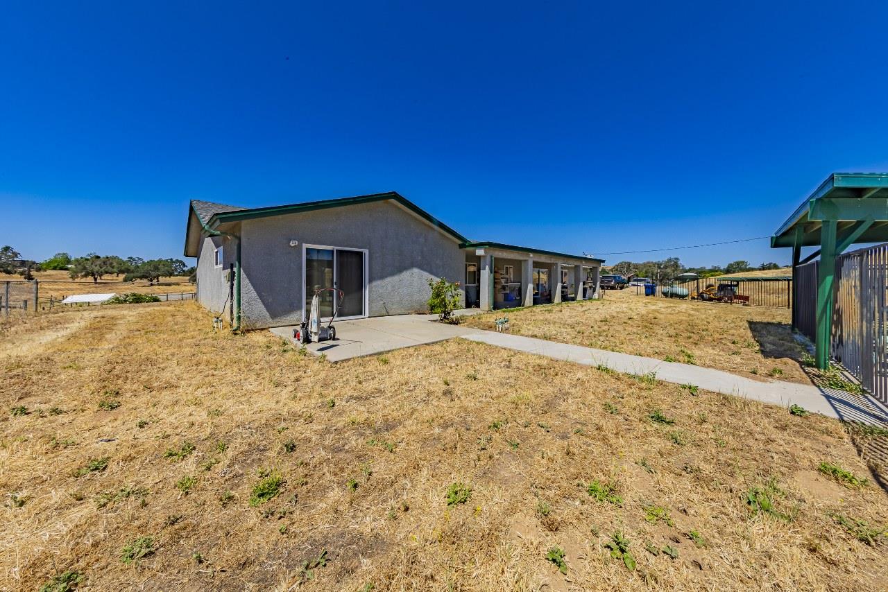 35095 Rough Rider Way Raymond, CA 93653 - Photo 44 of 57 a view of a house with a yard