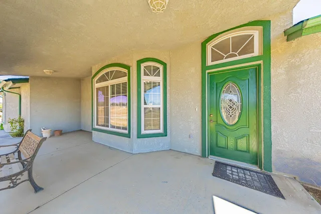 a view of entryway with stairs and wooden floor