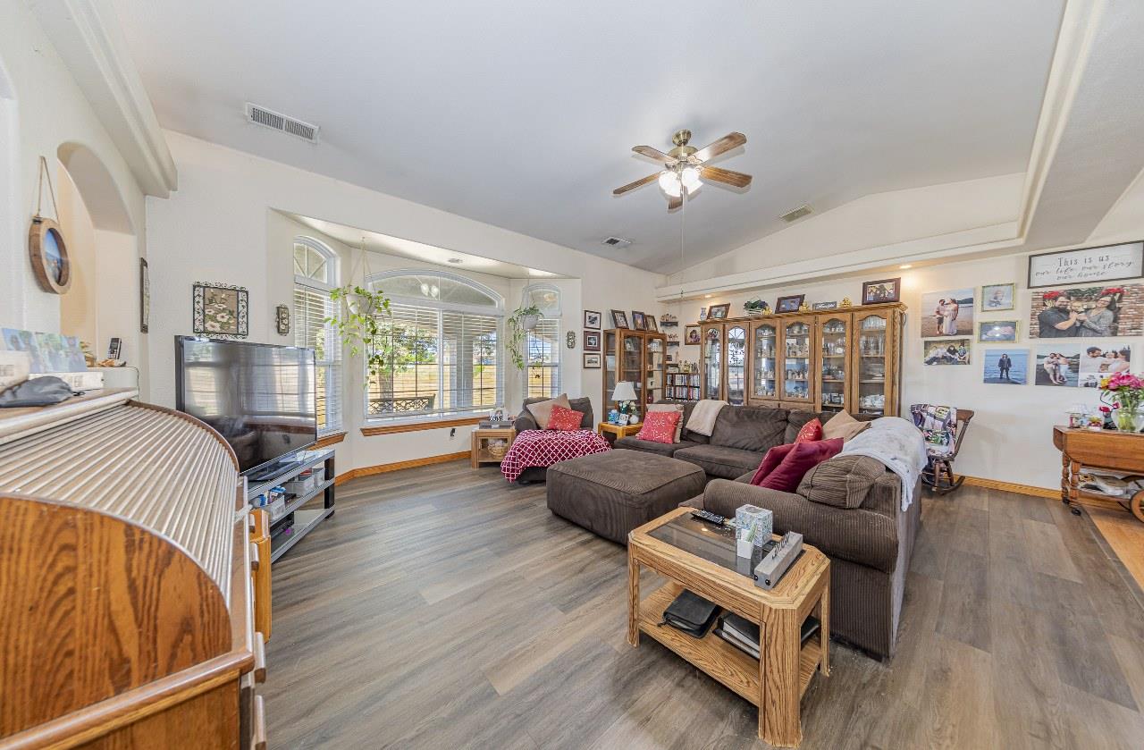 35095 Rough Rider Way Raymond, CA 93653 - Photo 10 of 57 a living room with furniture and wooden floor
