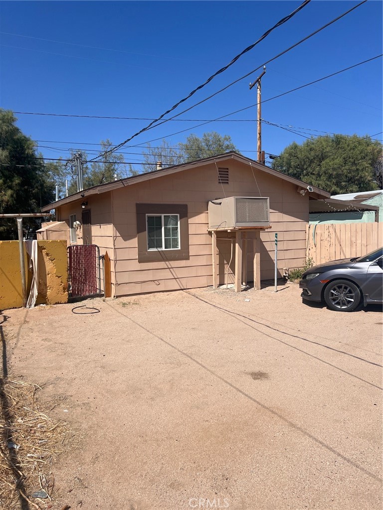128 West Haloid Avenue Ridgecrest, CA 93555 - Photo 6 of 6 a front view of a house with garage