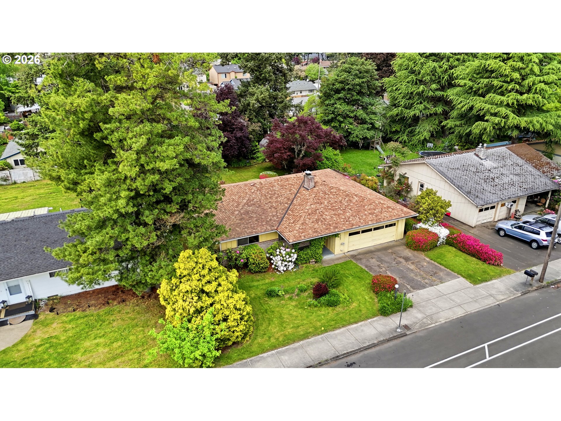3003 Southeast 162nd Avenue Portland, OR 97236 - Photo 35 of 41 a view of a garden
