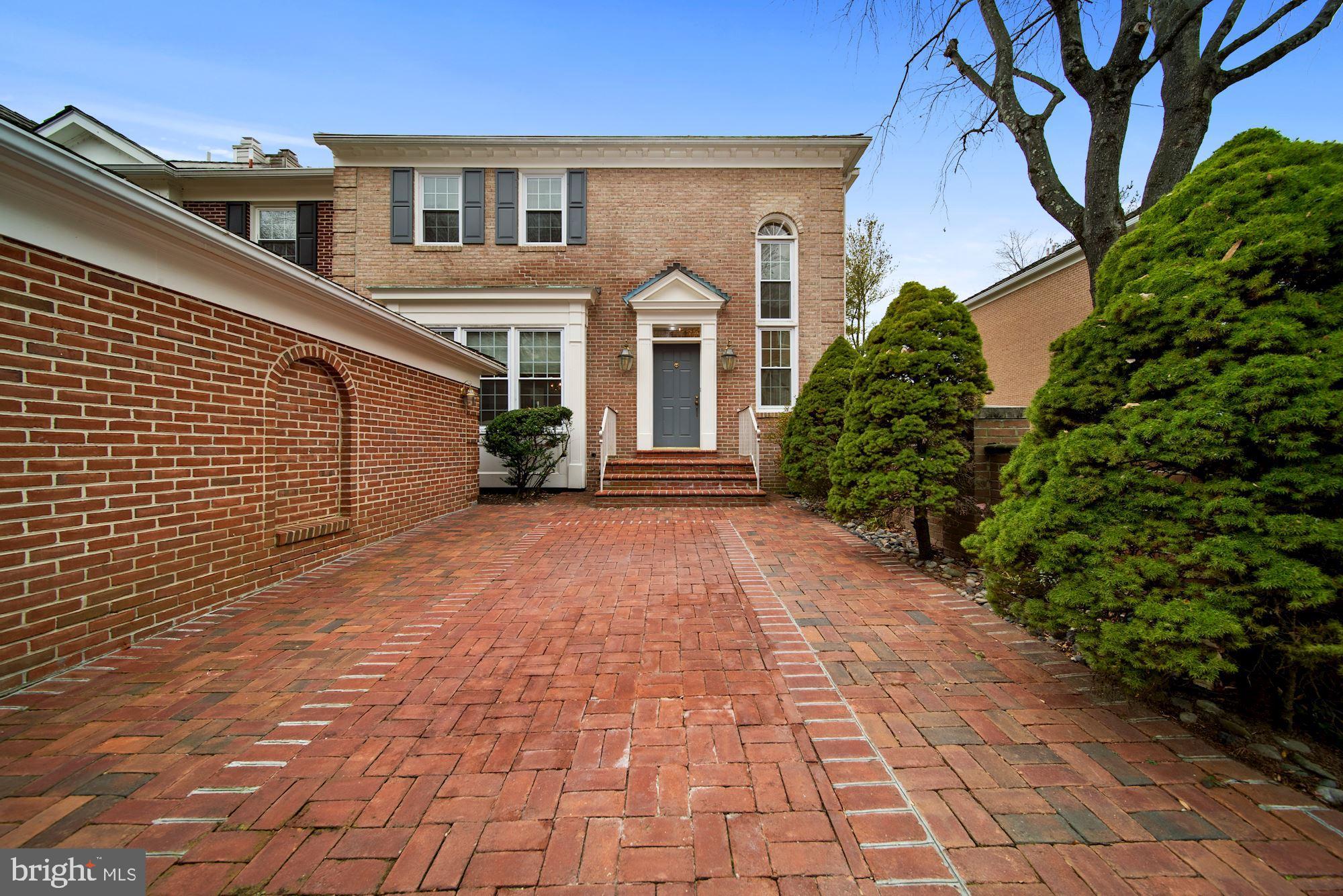 Front elevation with driveway parking