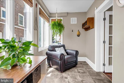 a sink sitting next to a white cabinet