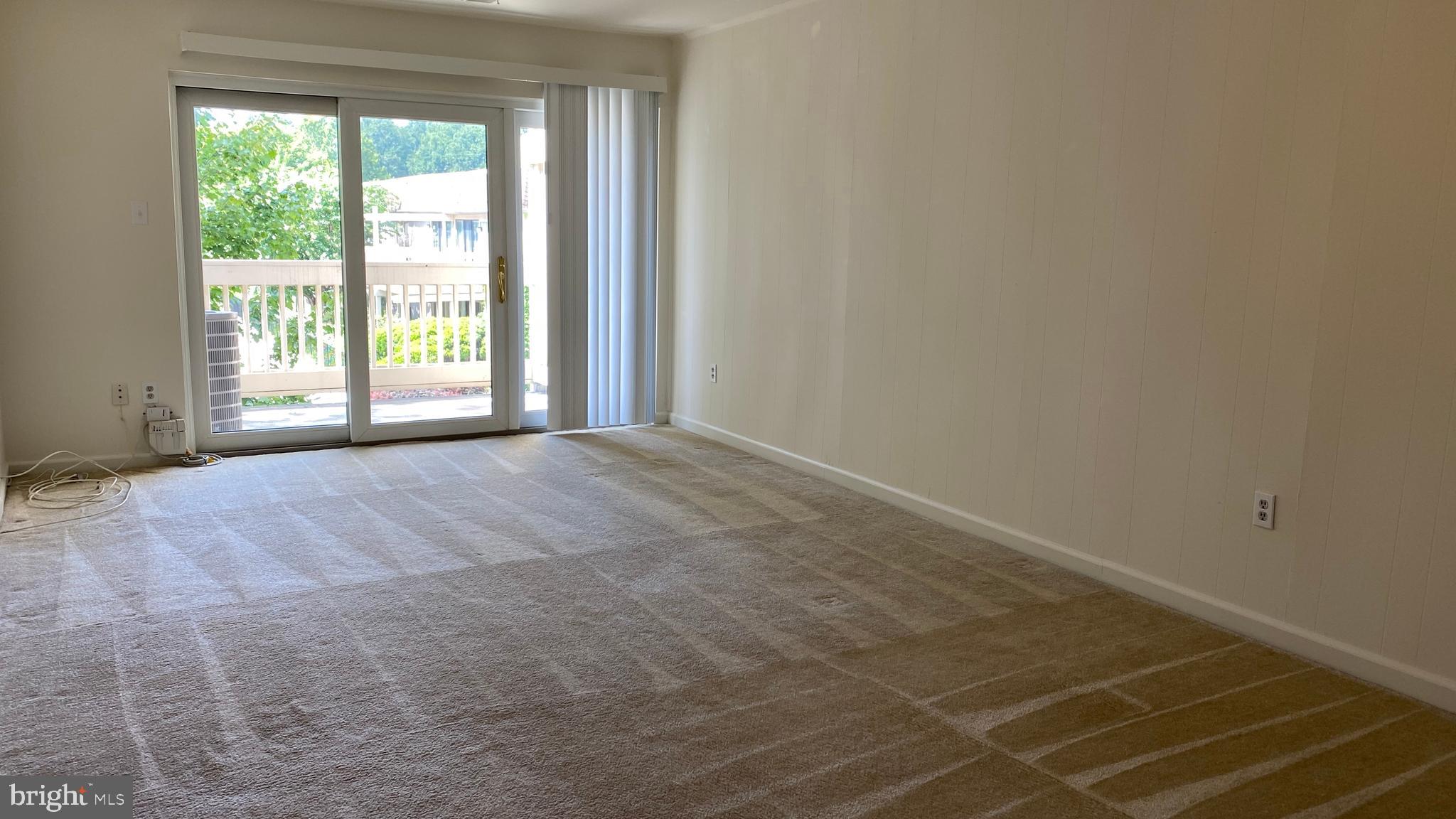 5766 Rexford Court, Unit Q Springfield, VA 22152 - Photo 6 of 29 LIVING ROOM TO THE BALCONY