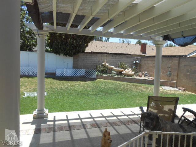 2450 Fitzgerald Road Simi Valley, CA 93065 - Photo 13 of 14 a view of a porch with a yard
