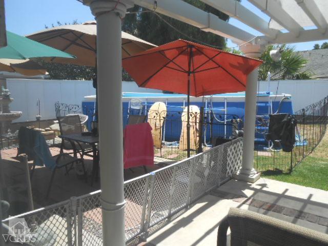 2450 Fitzgerald Road Simi Valley, CA 93065 - Photo 14 of 14 a patio with table and chairs