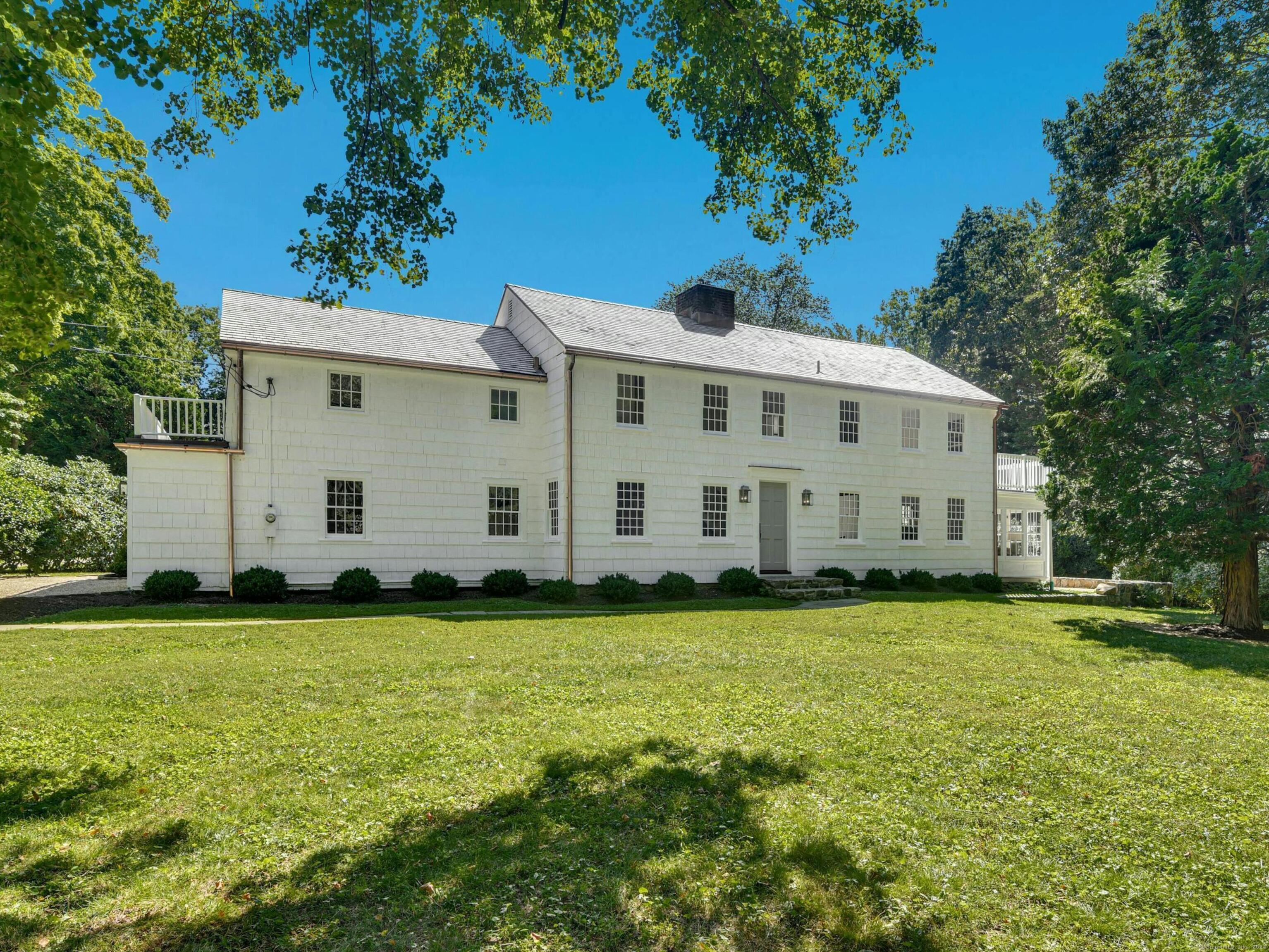 62 Richard's Lane New Canaan, CT 06840 - Photo 1 of 1 a view of a house with a garden
