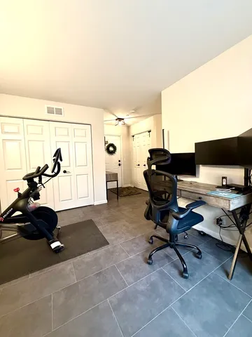 a kitchen with wooden floors and a sink