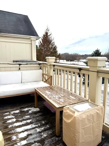 a view of a house with wooden fence
