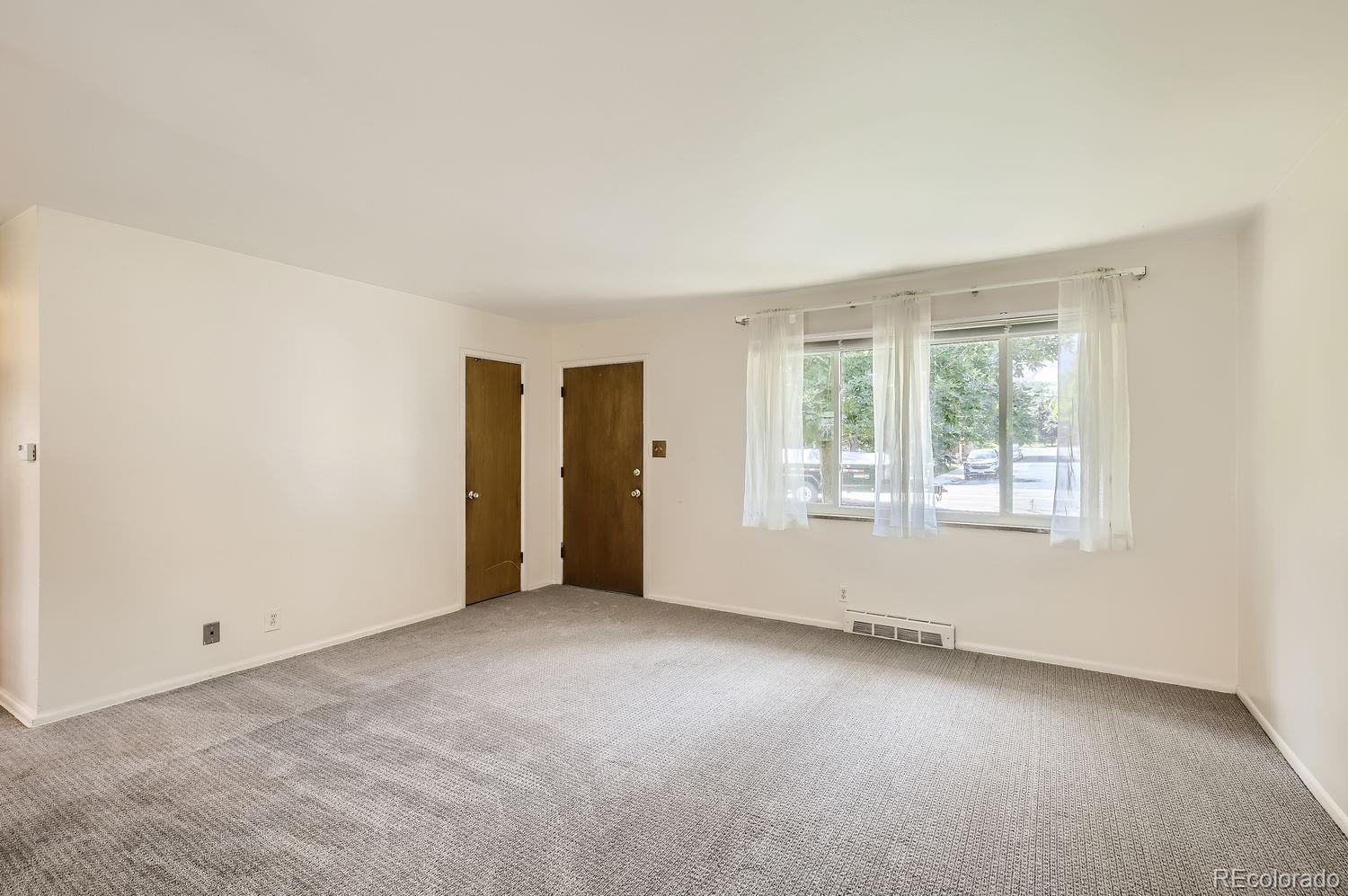 3205 Moorhead Avenue Boulder, CO 80305 - Photo 3 of 11 an empty room with windows