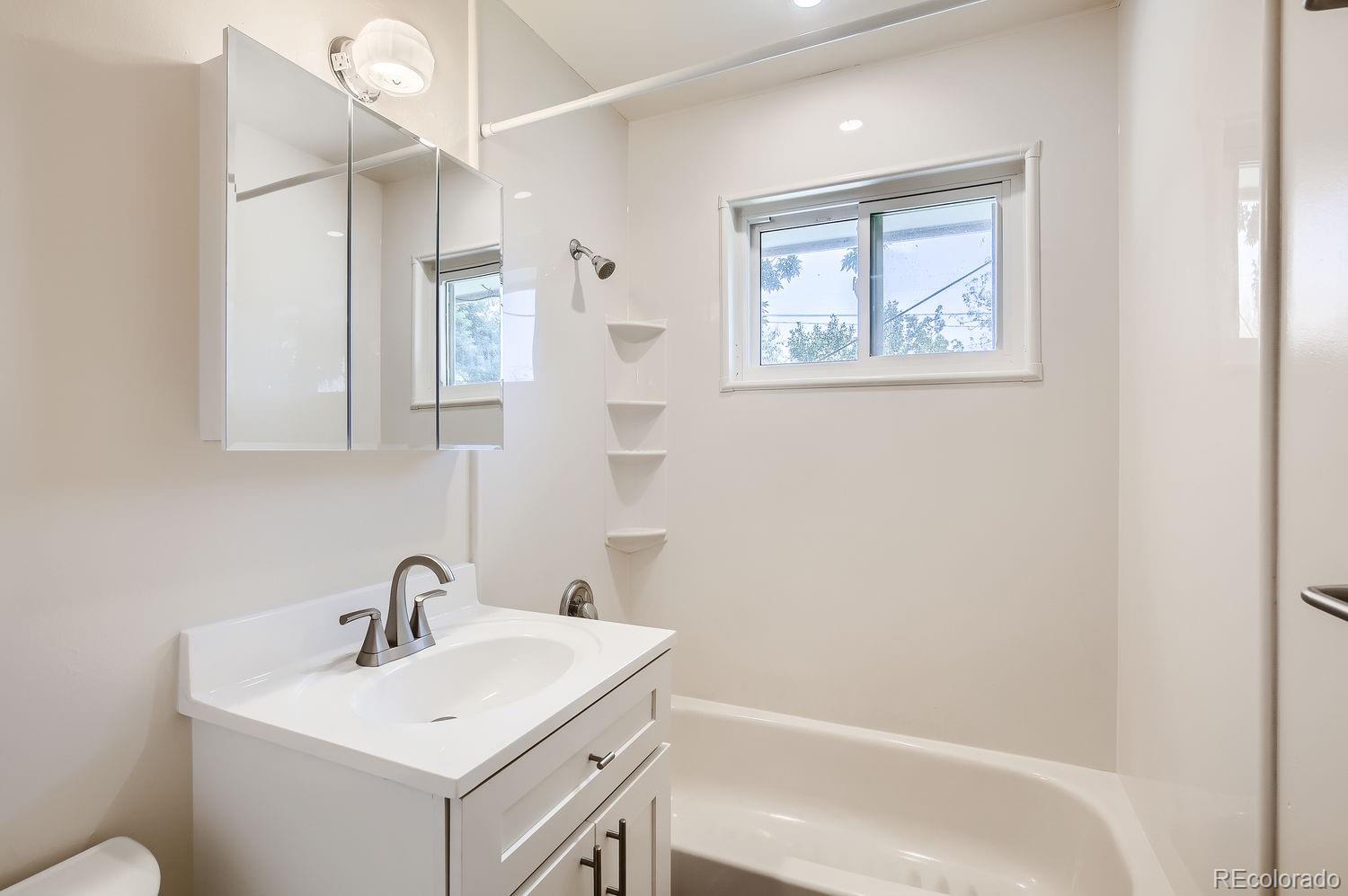 3205 Moorhead Avenue Boulder, CO 80305 - Photo 9 of 11 a bathroom with a sink and a bathtub