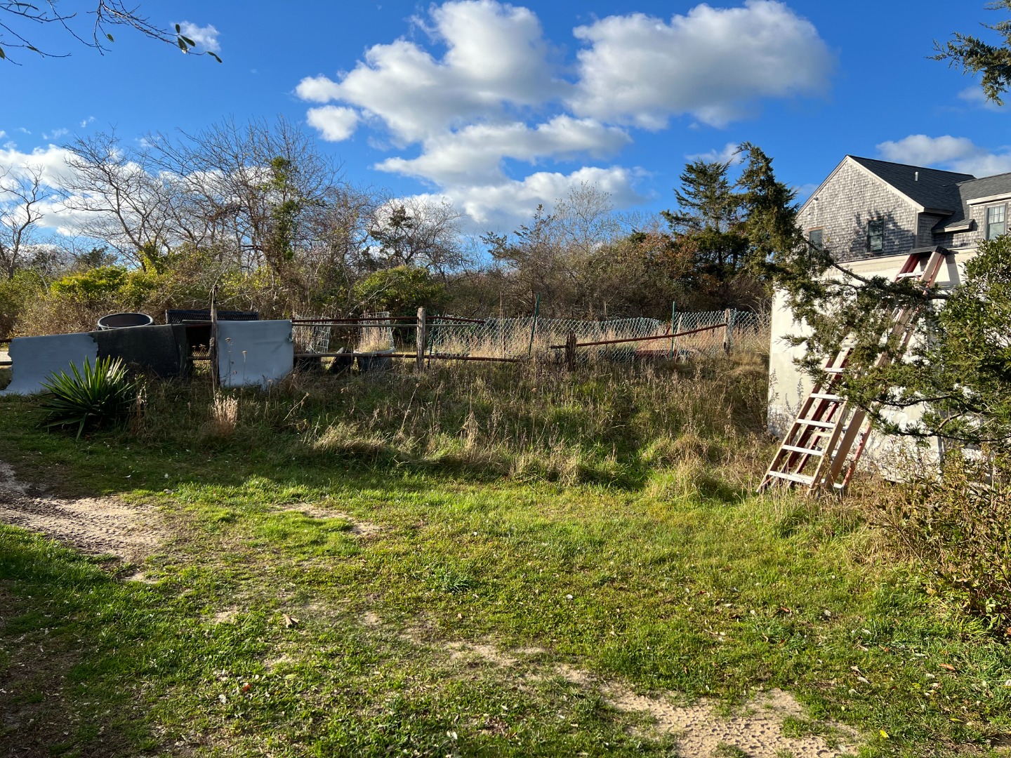 8 Cato Lane Nantucket, MA 02554 - Photo 2 of 3 a view of a lake with houses