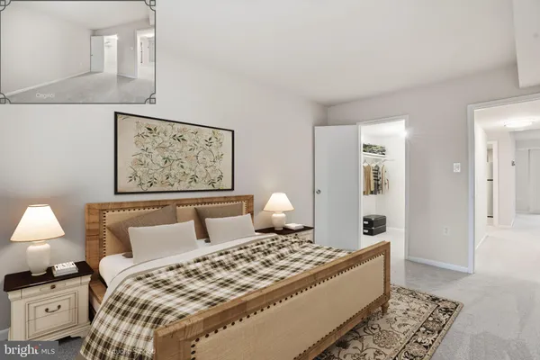 a bedroom with a bed and a lamp on table