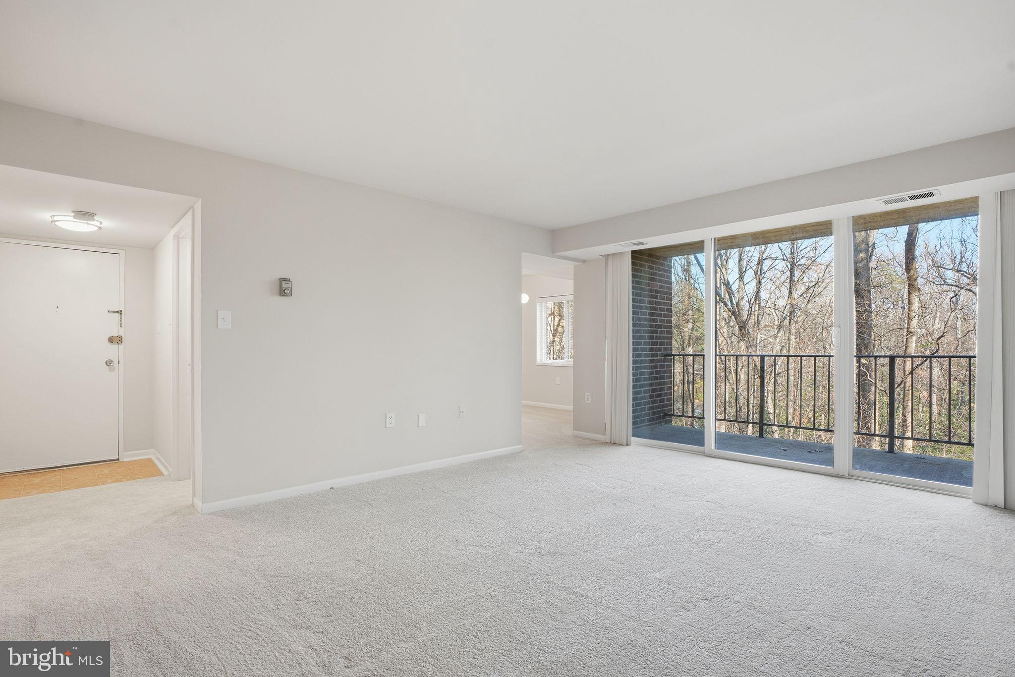 1552 Northgate Square, Unit 12B Reston, VA 20190 - Photo 6 of 23 a view of an empty room with a window