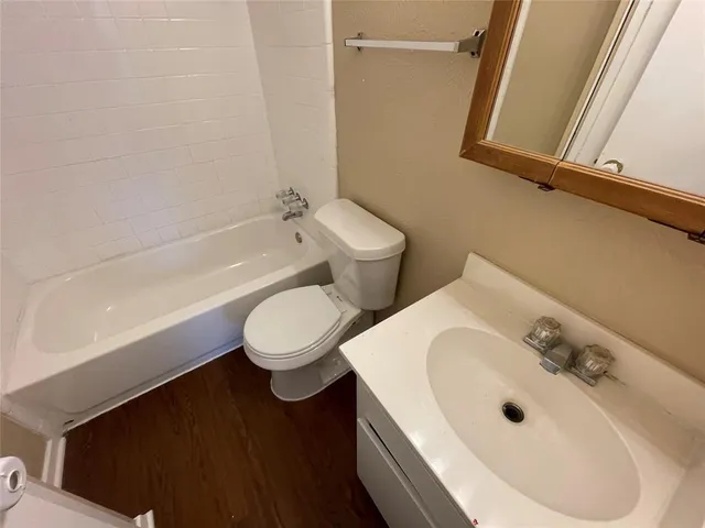 a bathroom with a sink and a toilet
