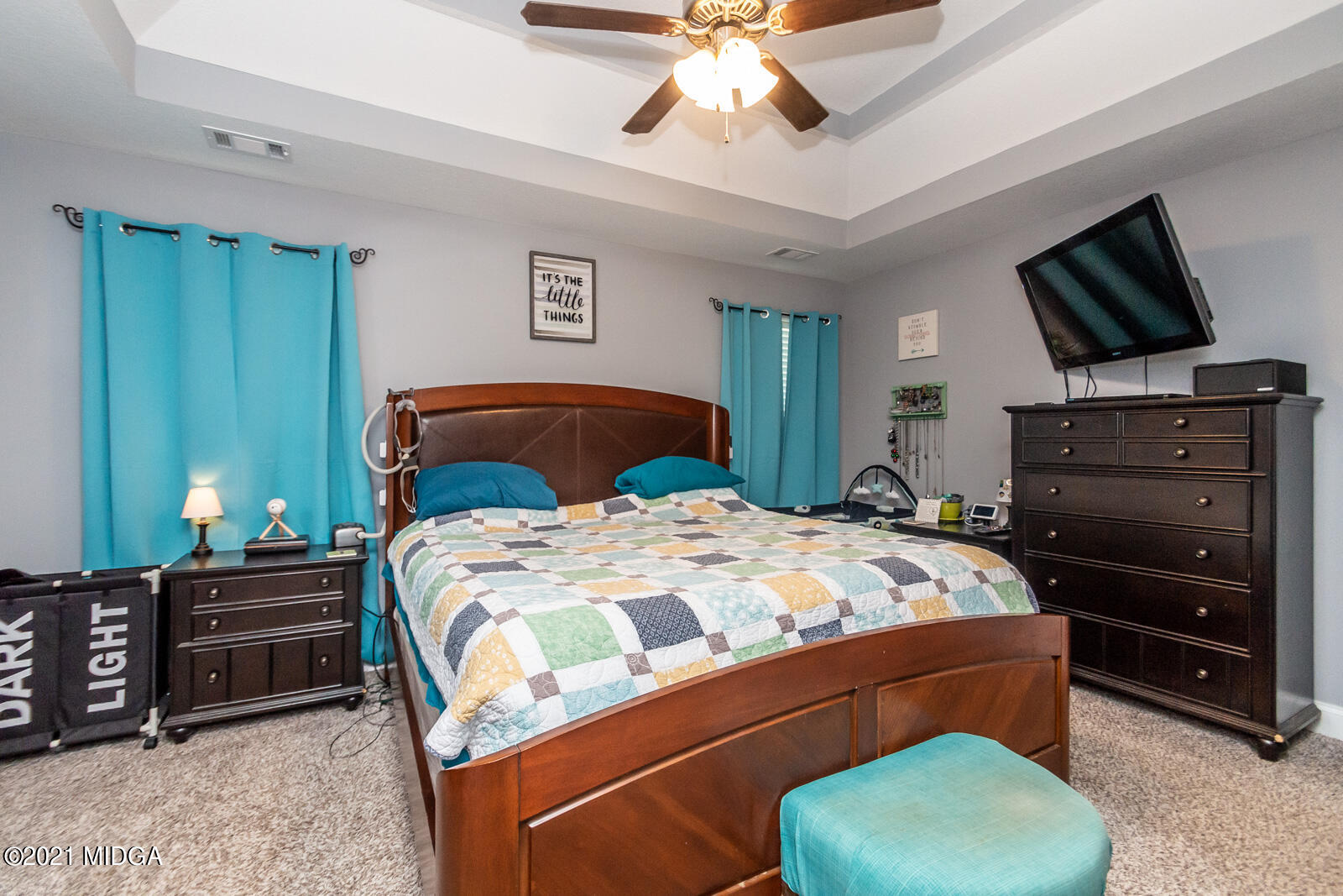 108 Hawk's Ridge Trace Byron, GA 31008 - Photo 14 of 31 a bedroom with a bed and a television
