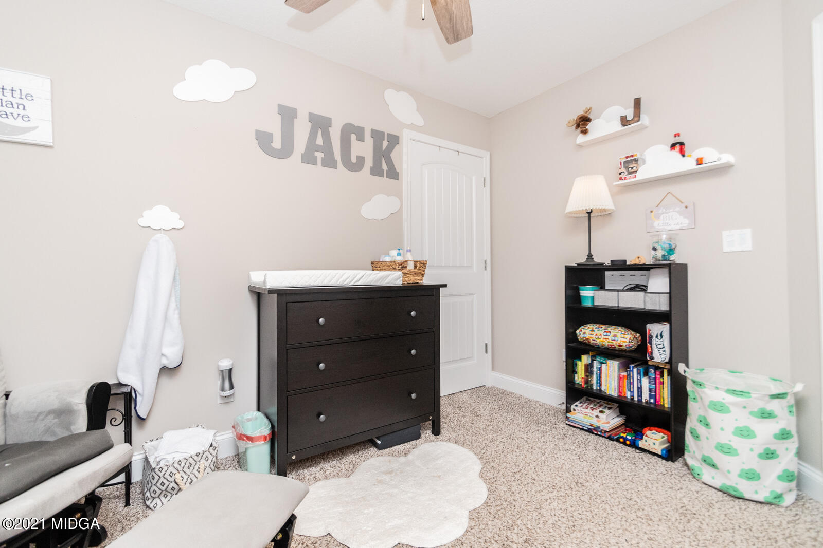 108 Hawk's Ridge Trace Byron, GA 31008 - Photo 22 of 31 a room with a dresser and a mirror