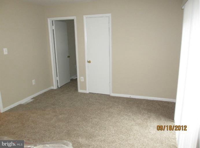 12418 Dewey Road Rockville, MD 20853 - Photo 13 of 20 a view of an empty room