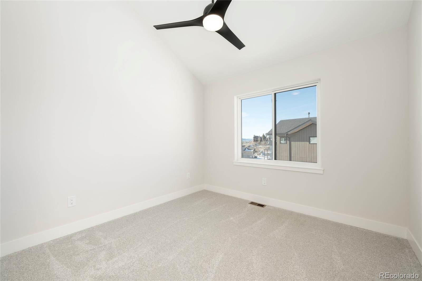 38 Wheeler Road Winter Park, CO 80482 - Photo 12 of 45 a view of an empty room with a window