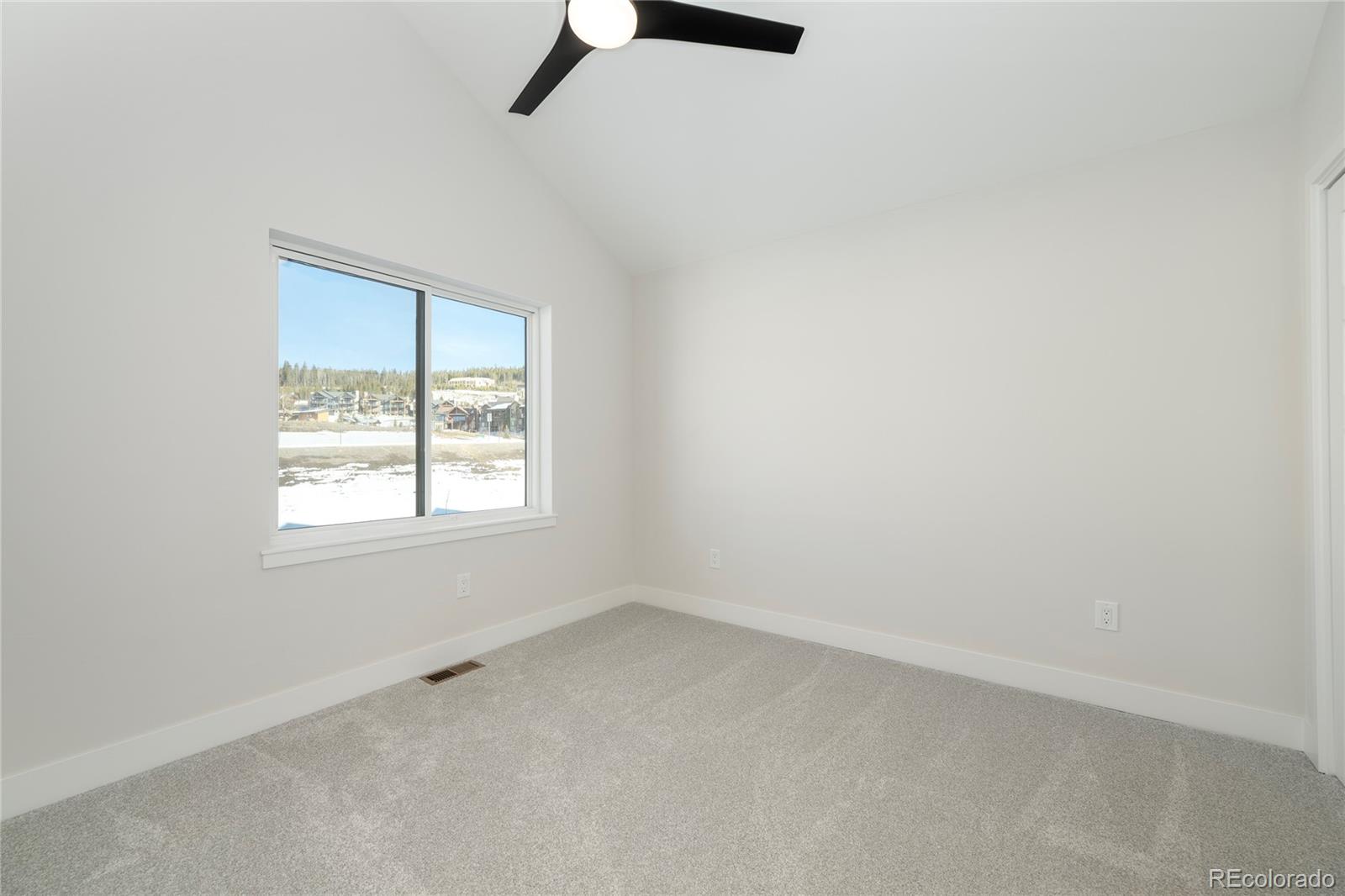 38 Wheeler Road Winter Park, CO 80482 - Photo 14 of 45 an empty room with a window