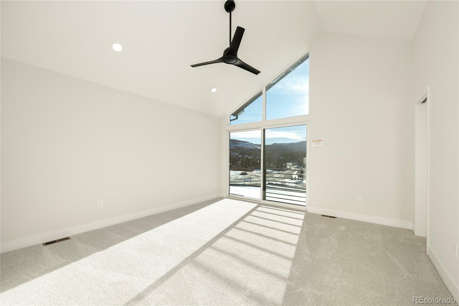 38 Wheeler Road Winter Park, CO 80482 - Photo 19 of 45 a view of wooden floor and a ceiling fan