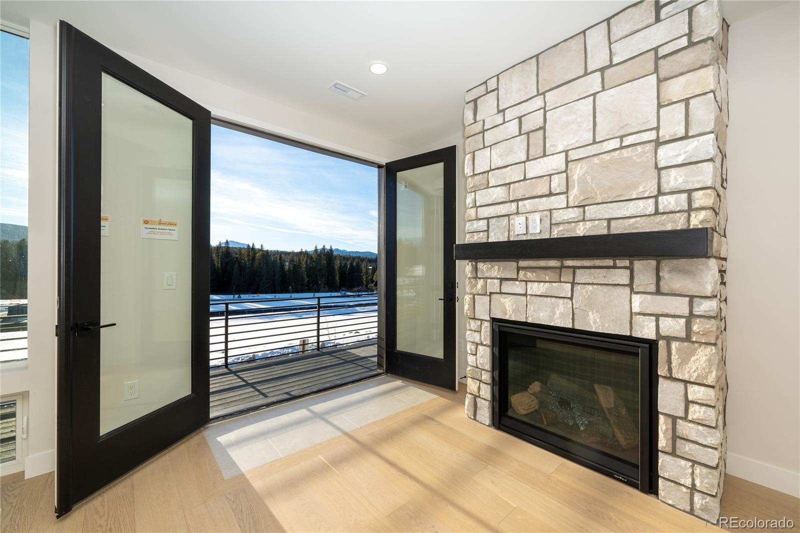 38 Wheeler Road Winter Park, CO 80482 - Photo 38 of 45 a living room with a fireplace