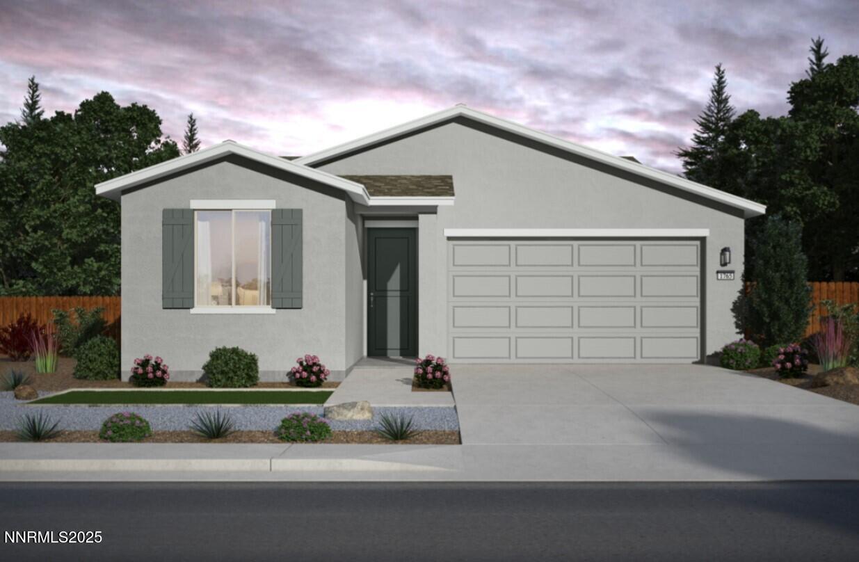 a front view of a house with garage