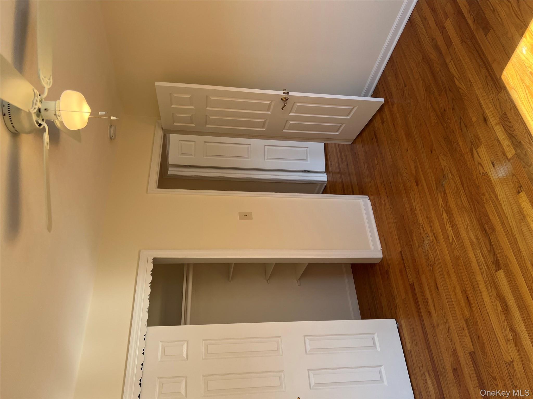 35 Prairie Avenue, Unit B Suffern, NY 10901 - Photo 7 of 11 an empty room with wooden floor closet and windows