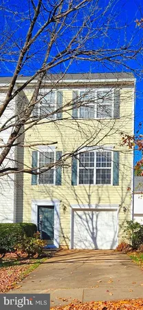 a view of a brick building with many windows