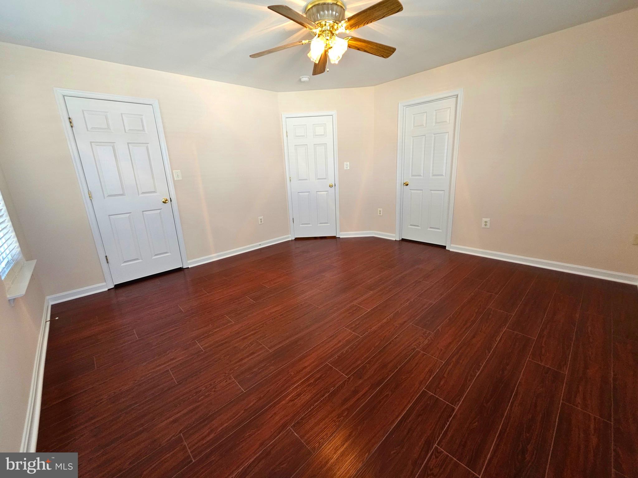 2238 Blue Spruce Drive Culpeper, VA 22701 - Photo 11 of 18 wooden floor in an empty room with a window