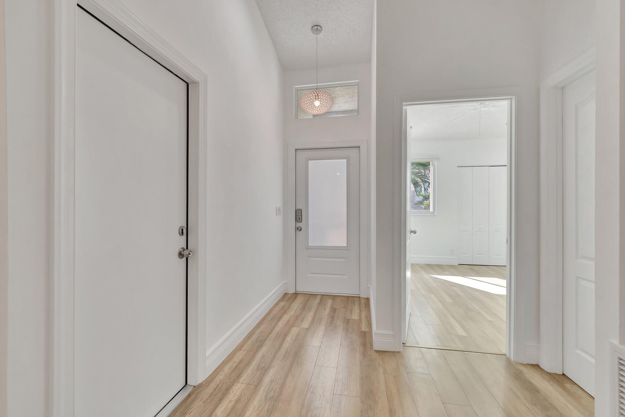 9237 Vineland Court, Unit F Boca Raton, FL 33496 - Photo 26 of 53 FRONT HALL 14