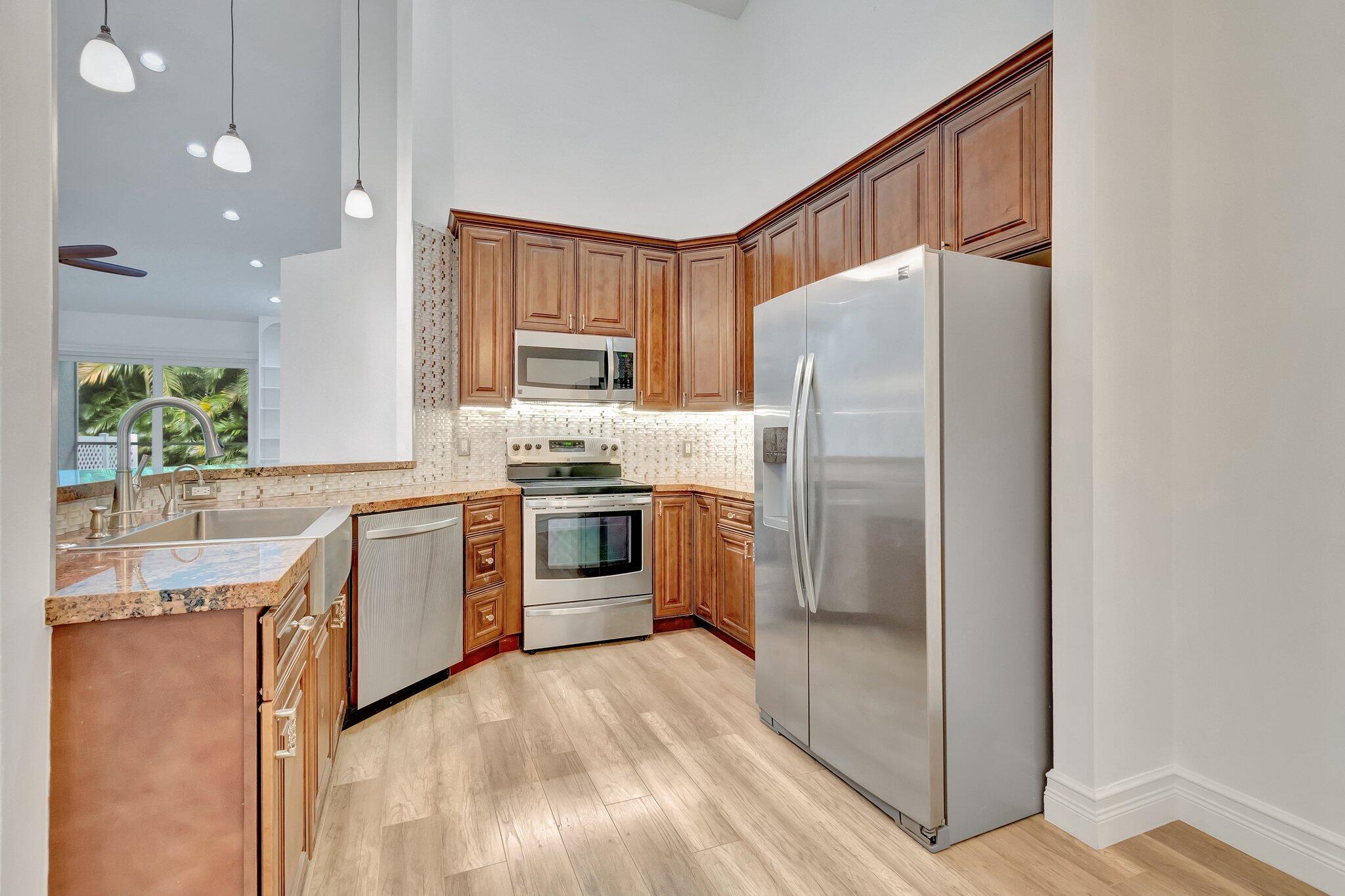 9237 Vineland Court, Unit F Boca Raton, FL 33496 - Photo 8 of 53 WOOD SOFT CLOSE