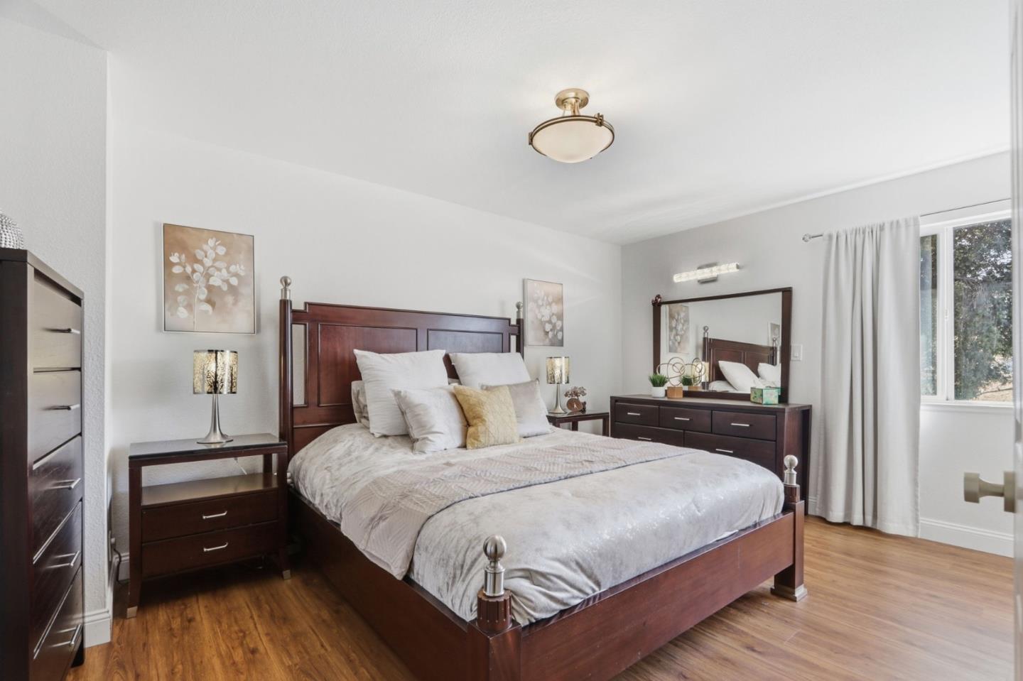 5888 Lean Way San Jose, CA 95123 - Photo 31 of 54 a bedroom with a bed and a dresser