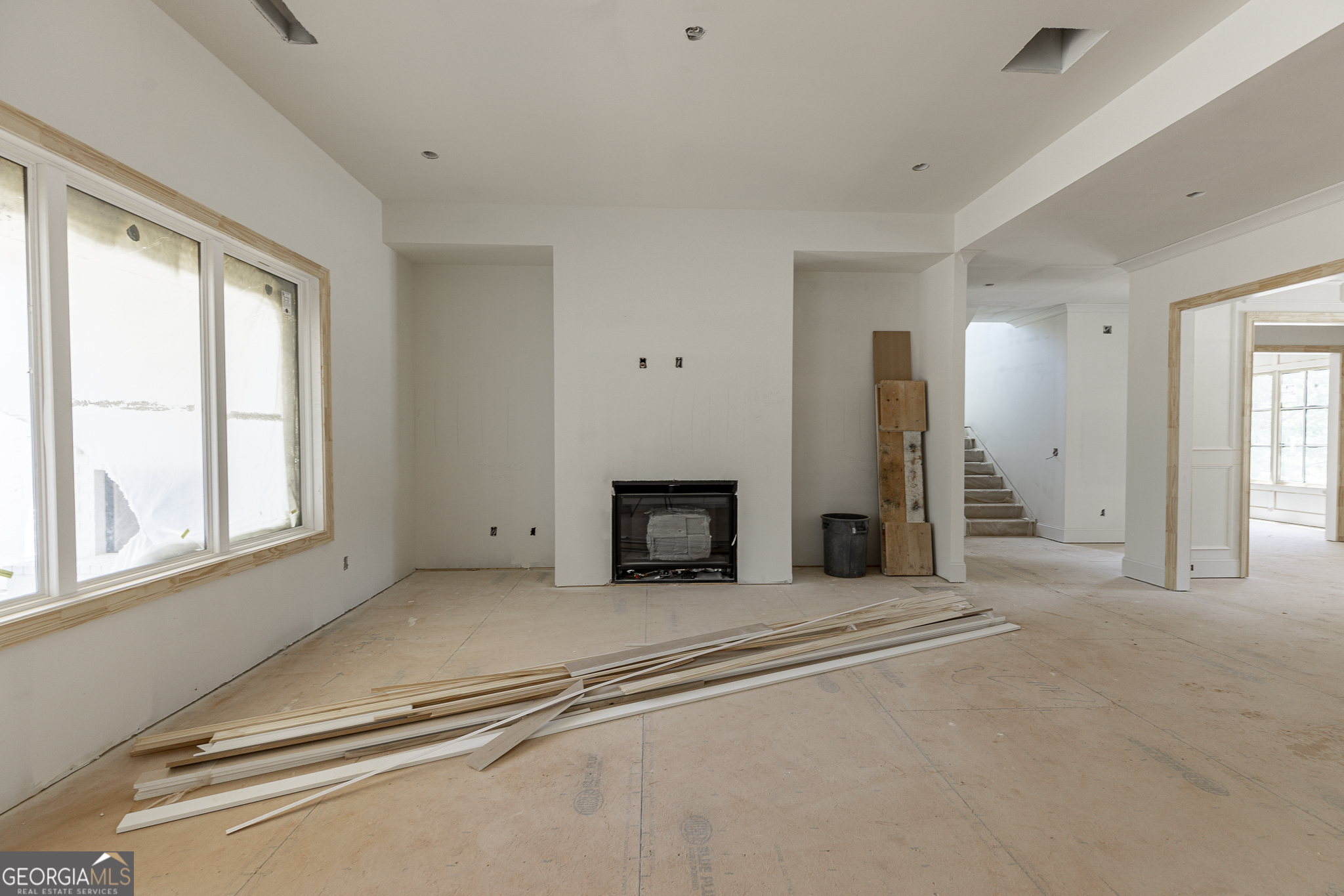 2969 North Bogan Road Northeast, Unit 1 Buford, GA 30519 - Photo 12 of 51 a view of a livingroom with a fireplace