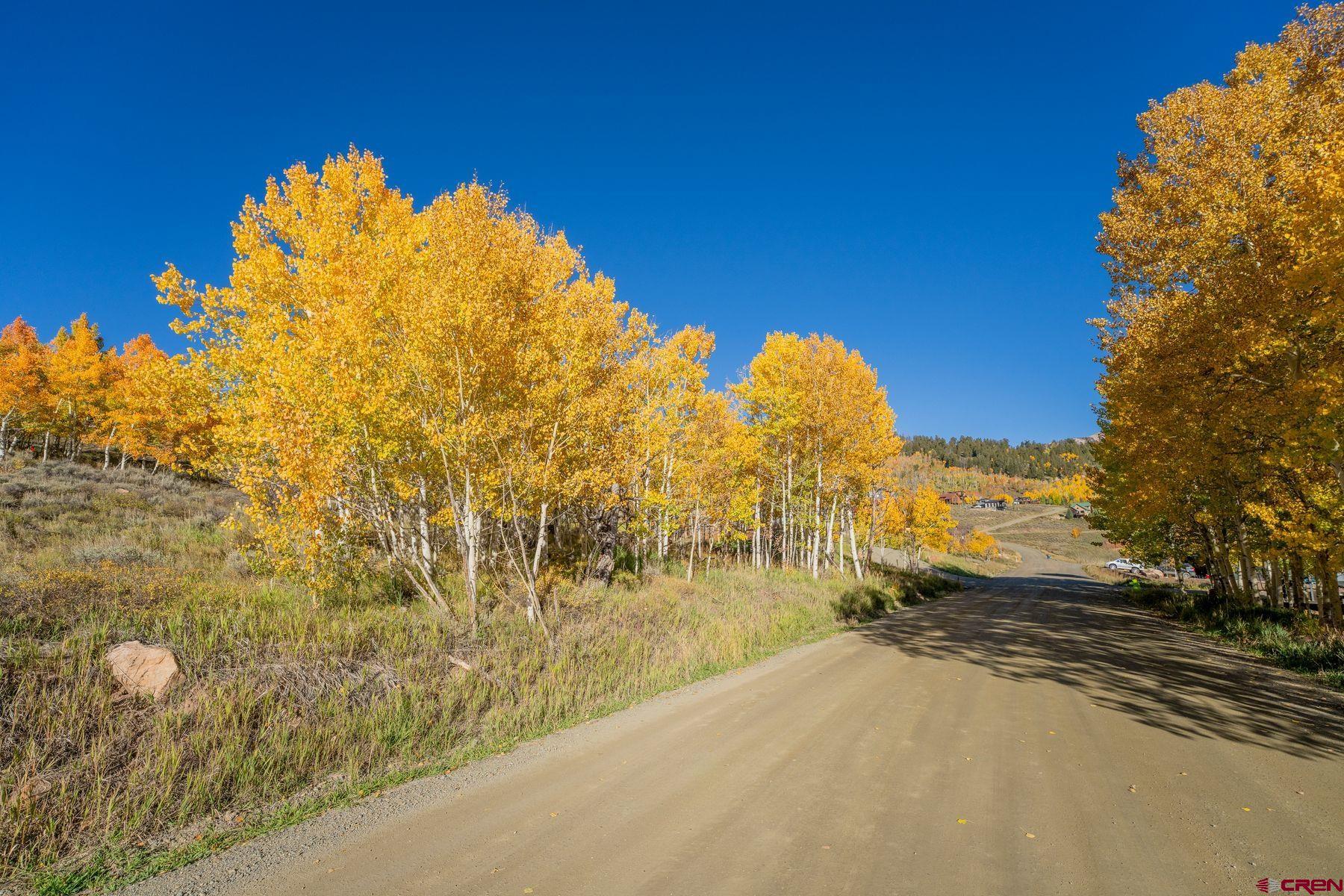 684 Zeligman Street Crested Butte, CO 81224 - Photo 15 of 18 a view of a large body of water with a building in the background