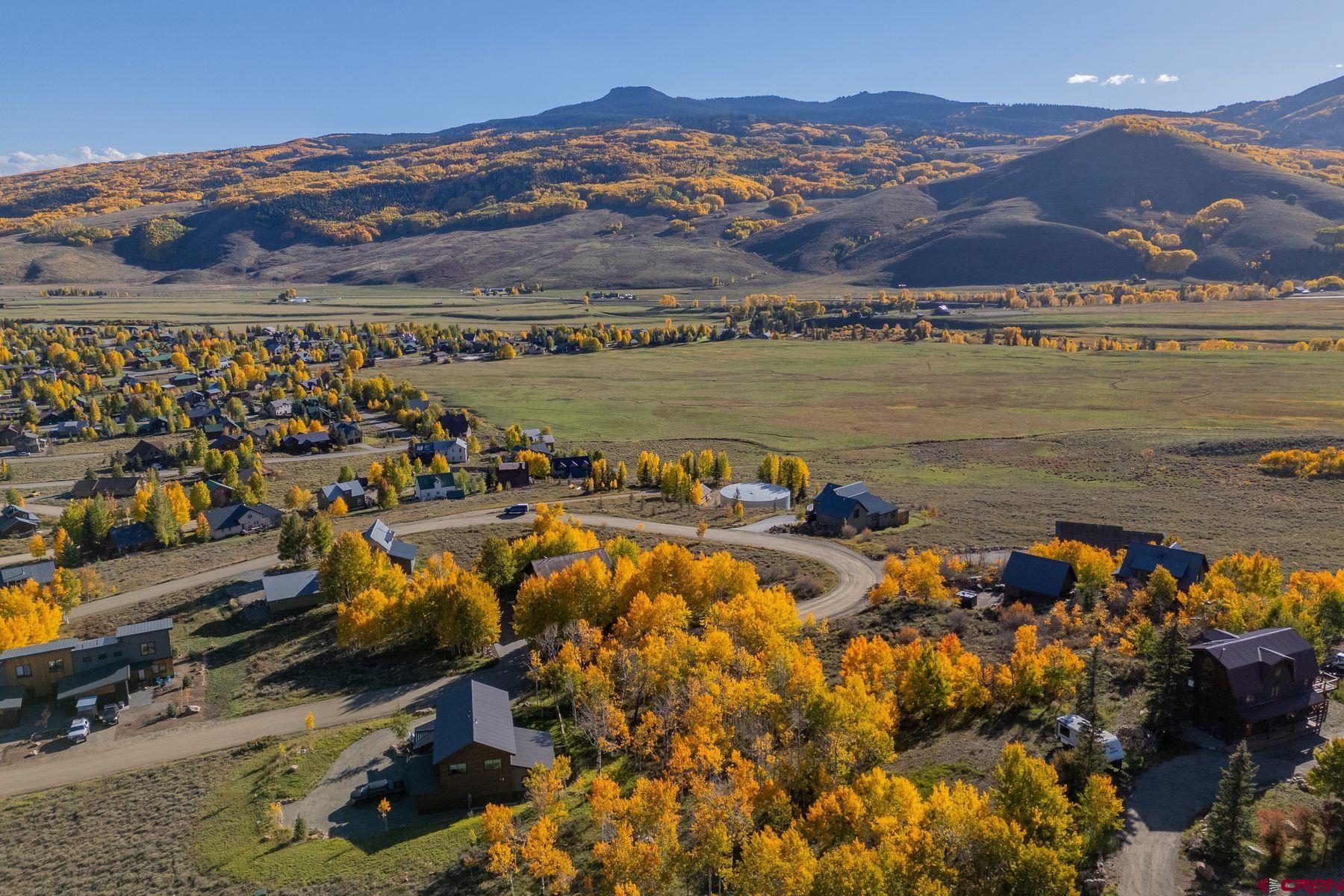 684 Zeligman Street Crested Butte, CO 81224 - Photo 7 of 18 a view of a city with an ocean view