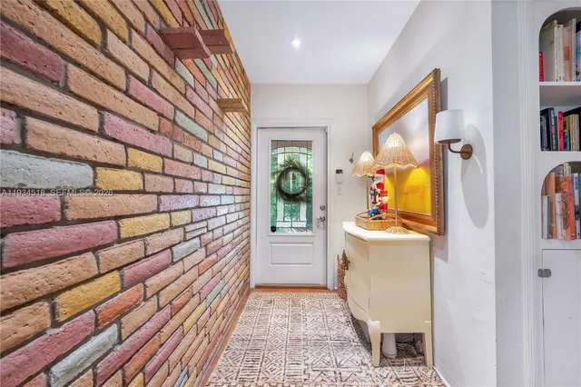 a bathroom with a sink and mirror